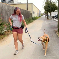 TIRR Memorial Hermann patient, Alese Zeman, walks her dog post-recovery.